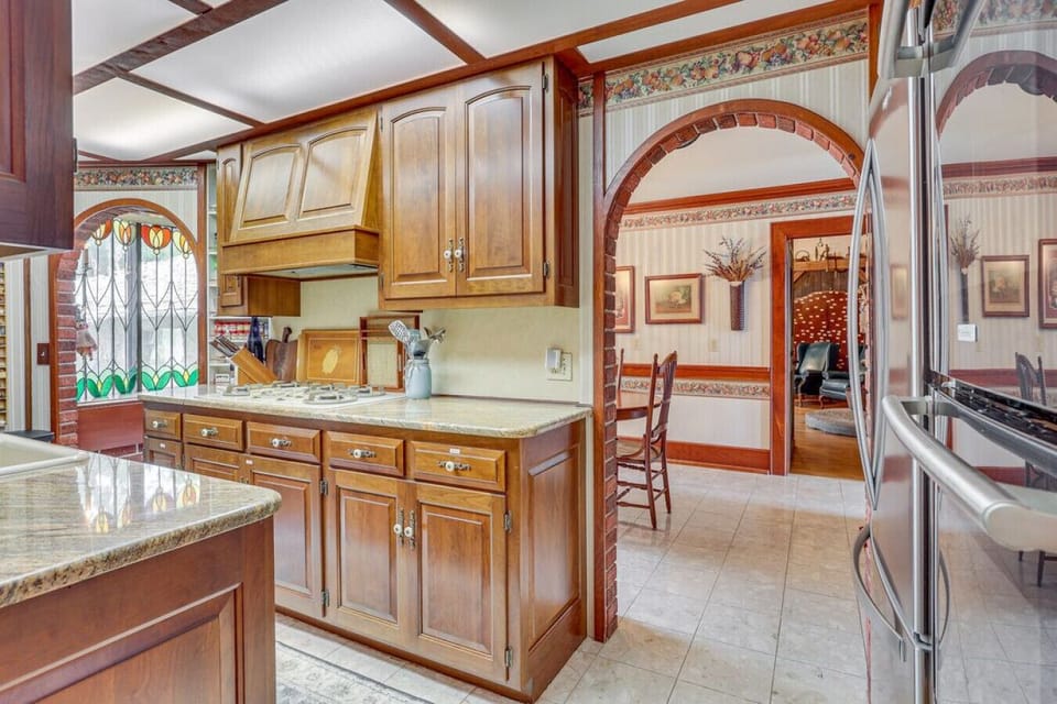 Kitchen | Rich Wood Cabinetry & Granite Counters