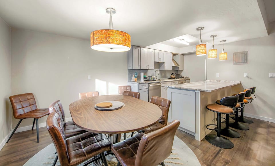 Gather and connect—open living, dining for 6, bar seating for 4