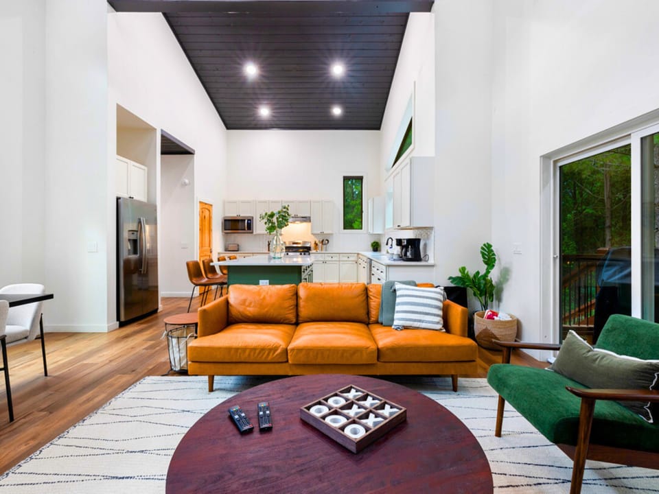 LIVING ROOM | Leather sofa, Accent Chairs, TV and gas fireplace