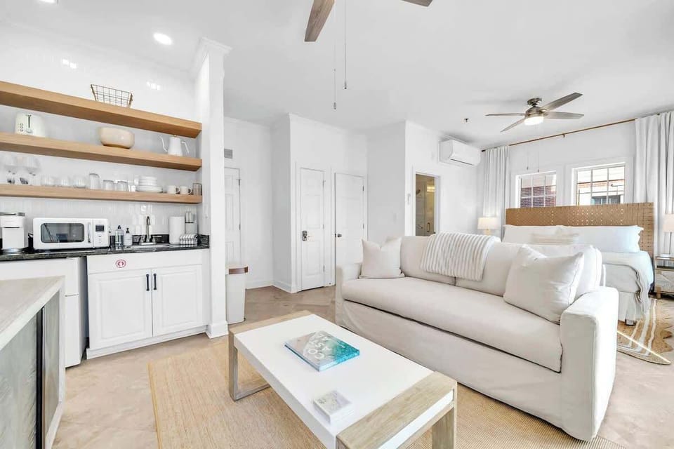 Condo features an open concept floor plan complete with a smart tv.