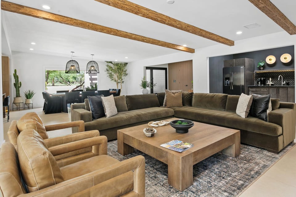 Living room with gorgeous beamed ceiling