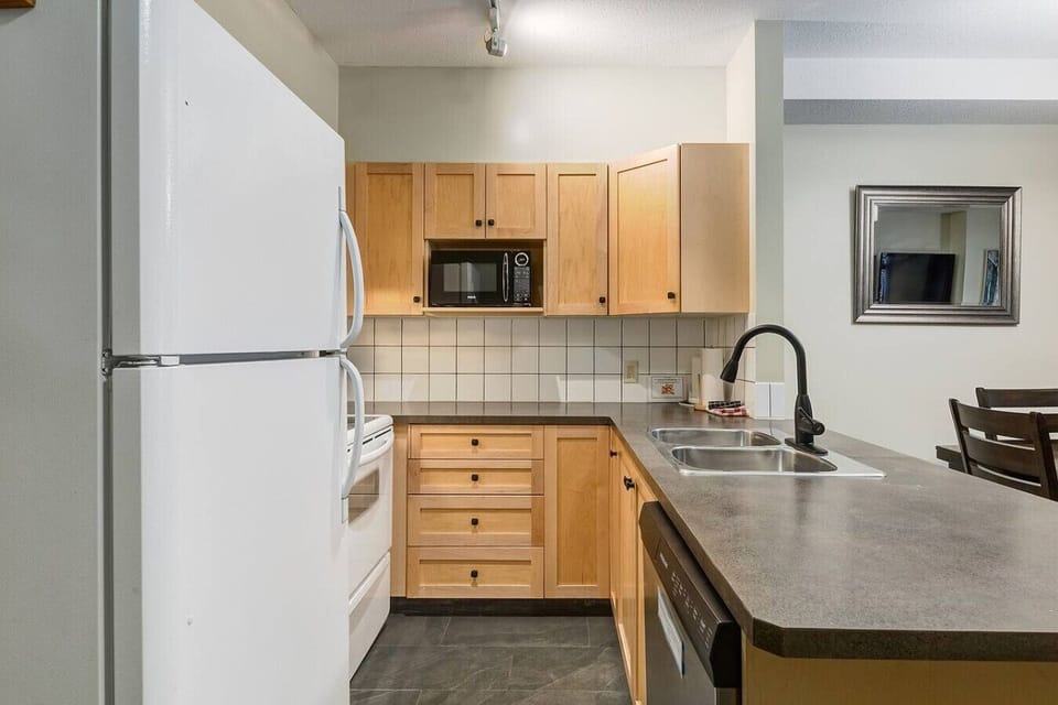 All amenities needed to cook your favourite meals can be found in this kitchen.