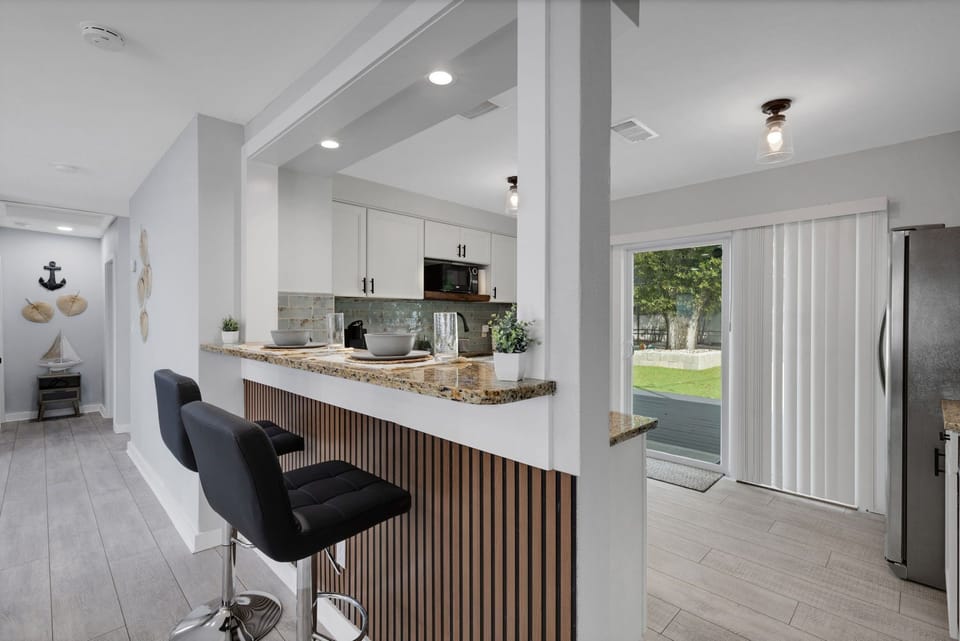 Bar seating for easy meals and additional dining space for your group