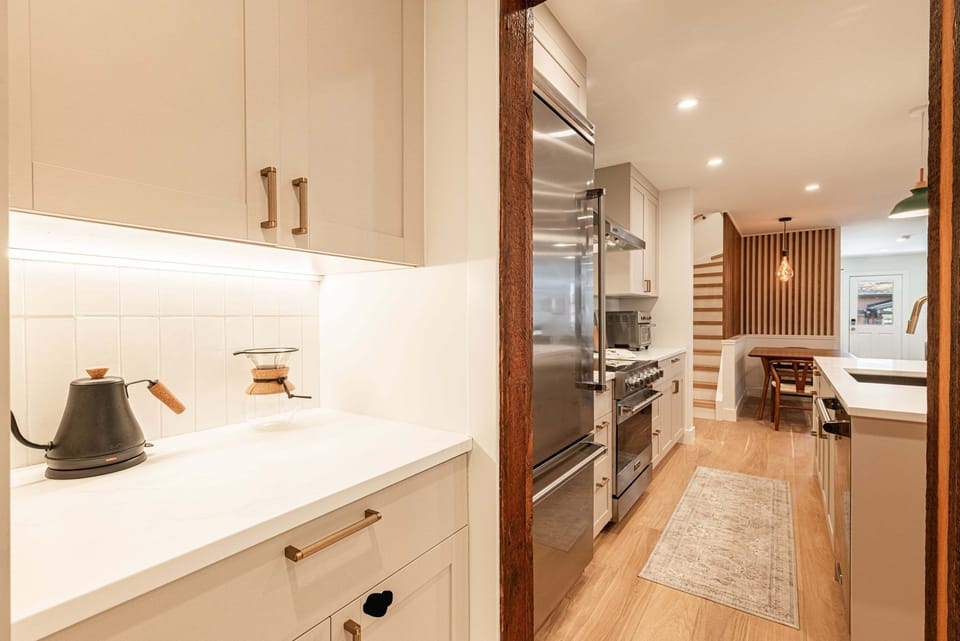 Sleek, fully renovated kitchen with modern finishes