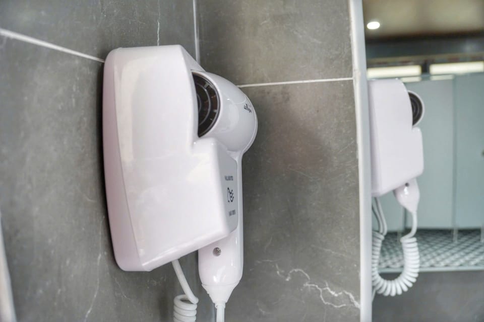 Shower, hair dryer, toilet paper