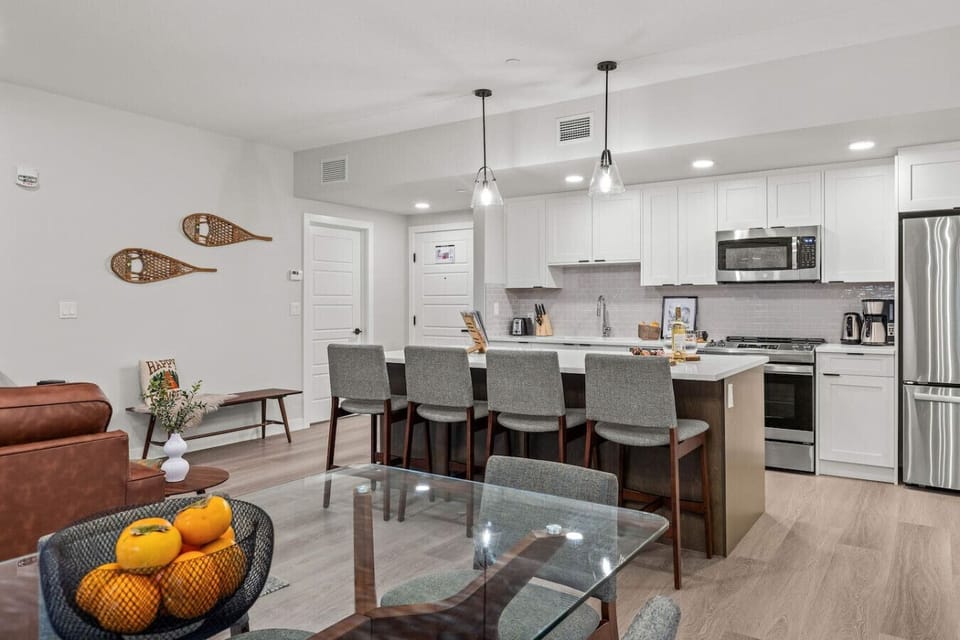 The modern kitchen features top-of-line appliances and cooking essentials, perfect for crafting home-cooked meals!