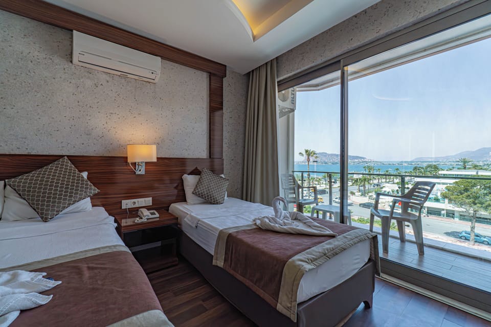 Standard Room, Balcony, Partial Sea View | Beach/ocean view