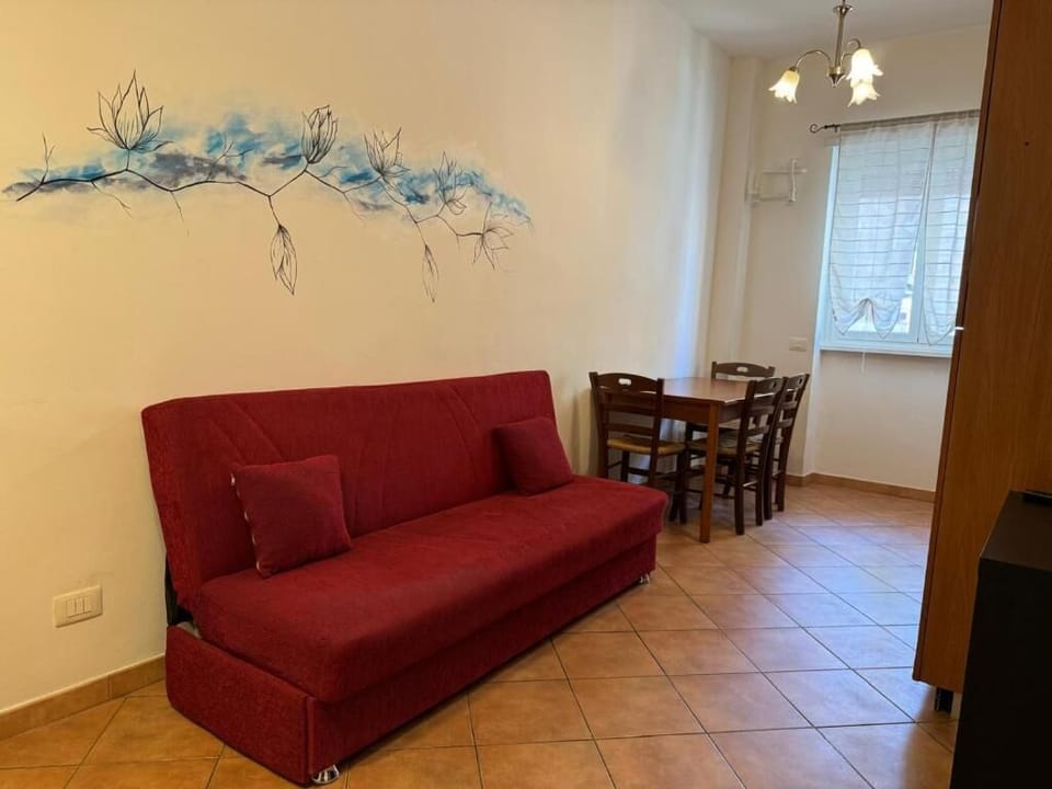 Apartment, City View | Living area | Flat-screen TV