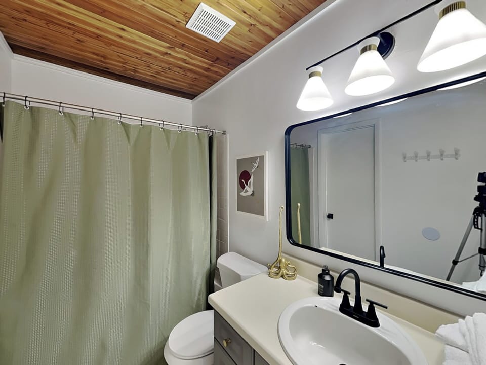 Jack and Jill Bathroom - Opens to Primary Bedroom and Hall - Shower/Tub Combo - Second Floor