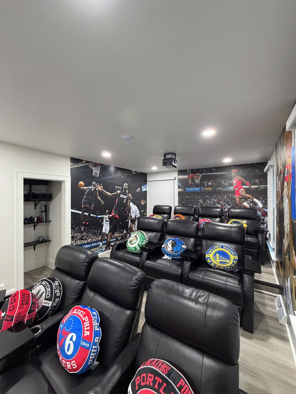 Kick back in your private sports lounge with plush leather seating and entertainment setup for the ultimate game day experience.