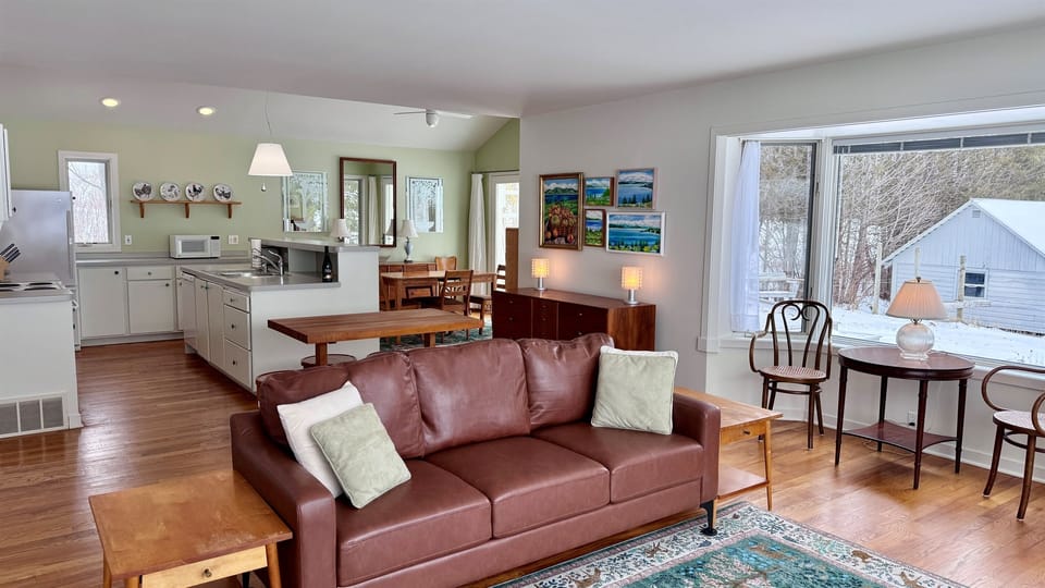 Open living and dining area filled with natural light.