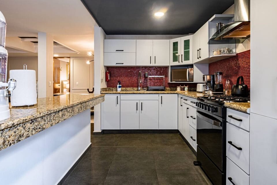 Open-concept kitchen that’s perfect for casual snacks or big meals