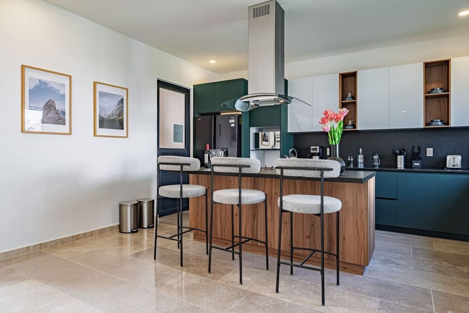 Modern kitchen with a bar for drinks