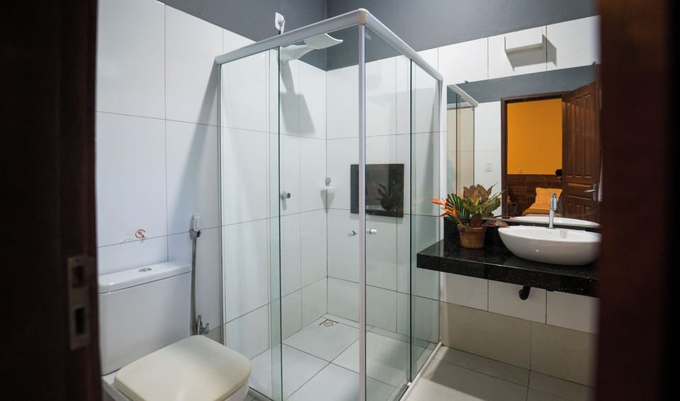 Standard Quadruple Room | Bathroom | Shower, free toiletries, towels, soap