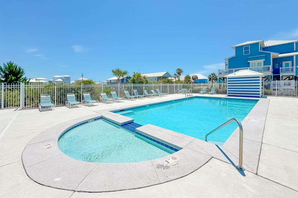 Resort-style community pool perfect for cooling off after beach days.