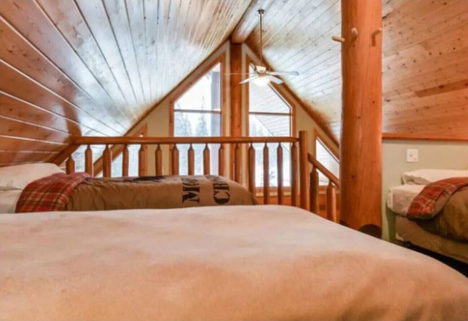 Beds in the loft space.