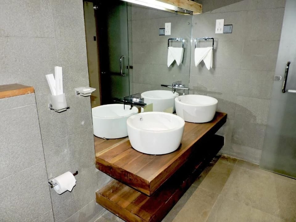 Deluxe Double Room, Balcony, Pool View | Bathroom | Shower, hair dryer, towels, soap