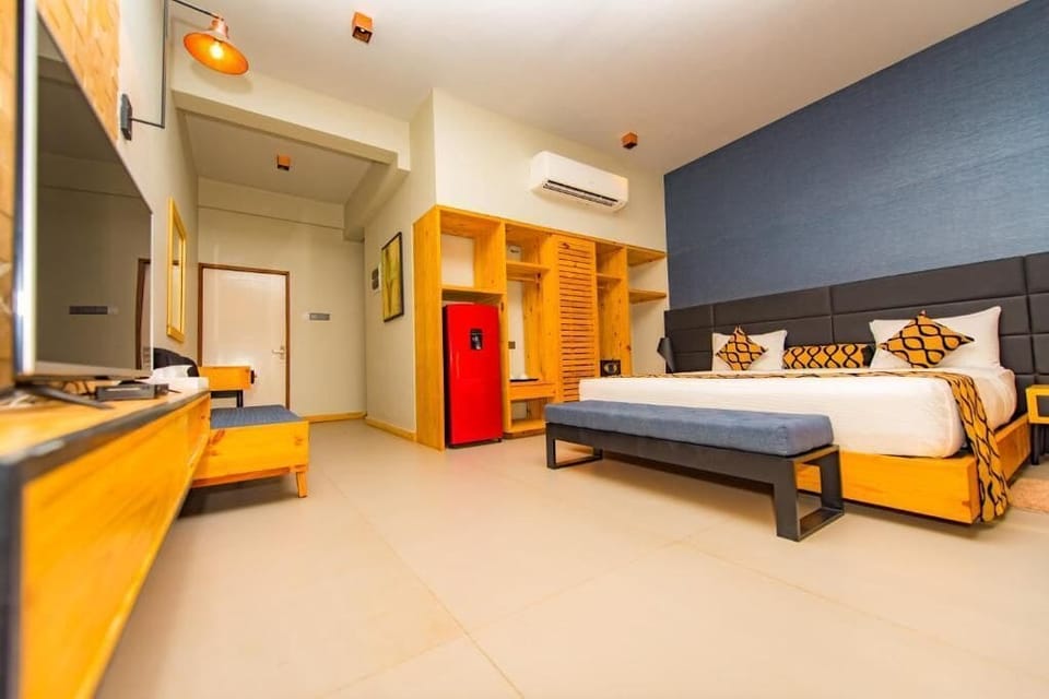 Deluxe Double Room, Balcony, Pool View | Desk, laptop workspace, free WiFi