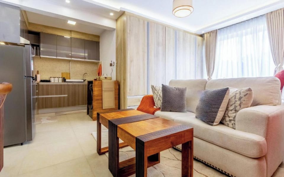 Superior Studio Suite | Living area | Flat-screen TV