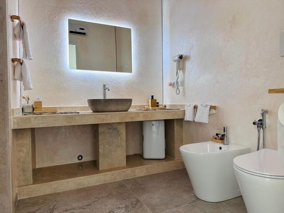 Shower, free toiletries, hair dryer, slippers