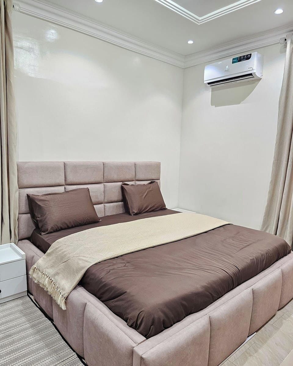 Comfort Apartment, Balcony, City View | In-room safe, desk, laptop workspace, blackout drapes