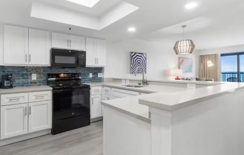 Cook with ease in a sleek kitchen with generous counter space.