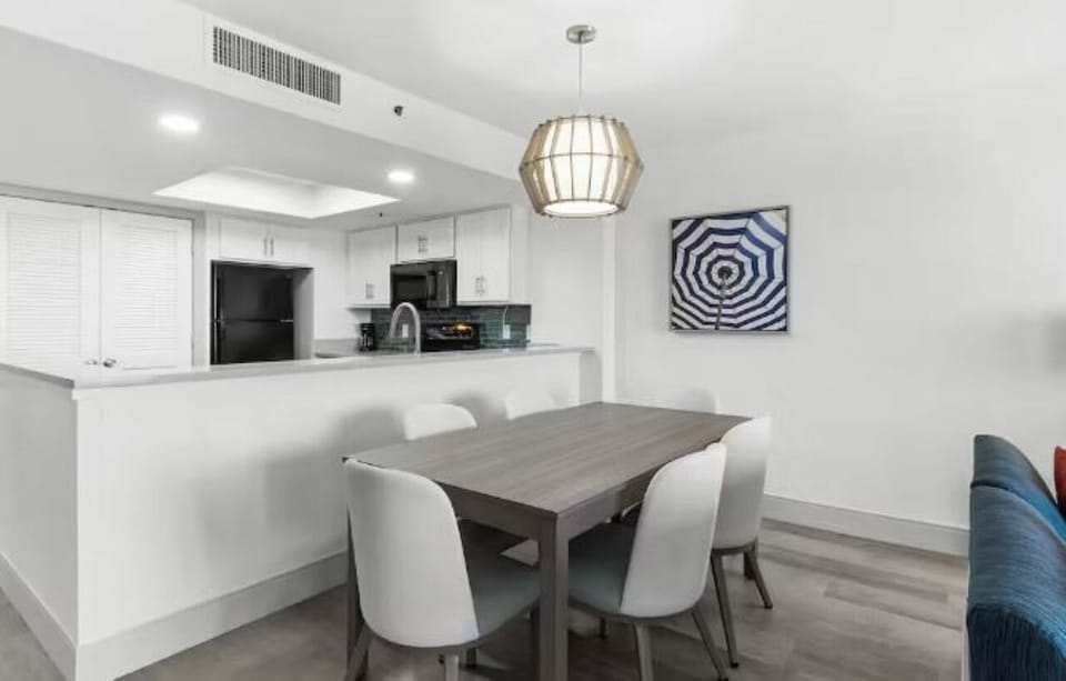 Serve cocktails and snacks at the spacious breakfast bar.