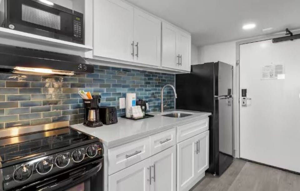Enjoy effortless stays with a full kitchen and roomy fridge.
