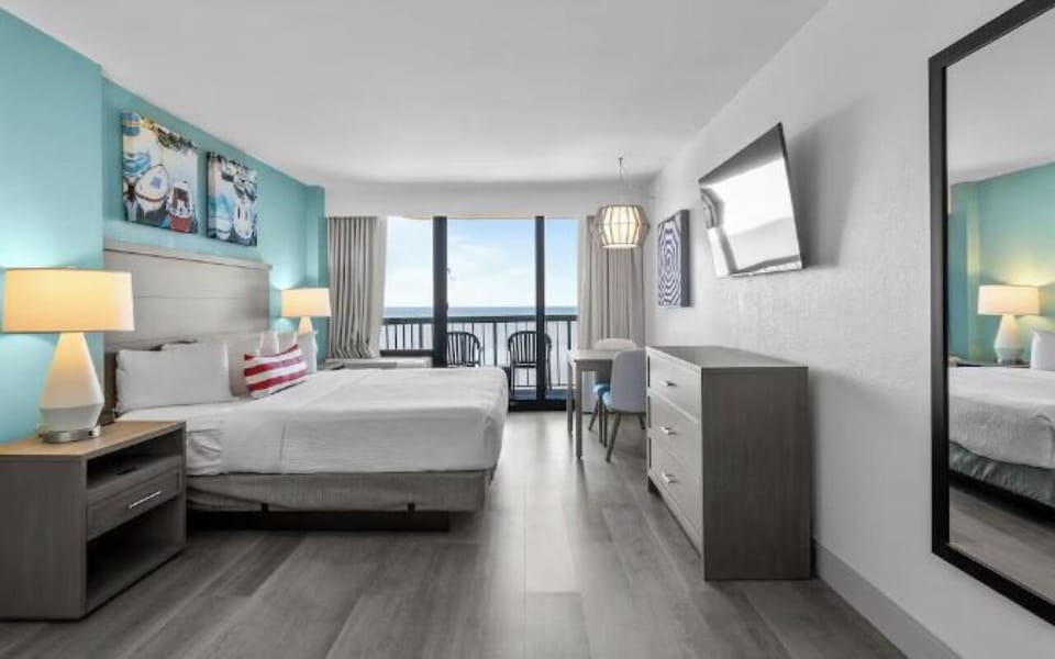 Soak in sweeping ocean views from bed and balcony.