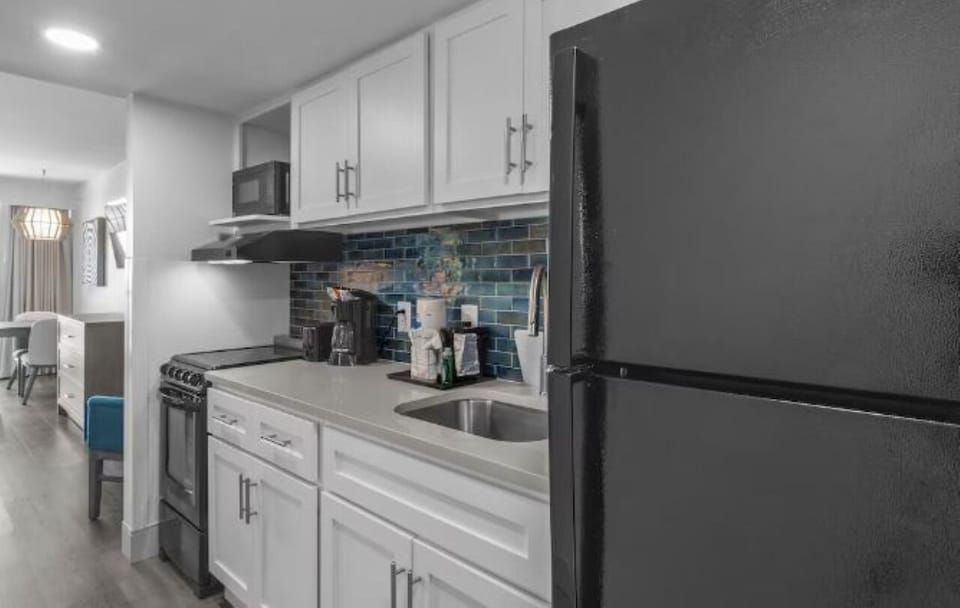 Prep snacks easily on generous counters with modern appliances.