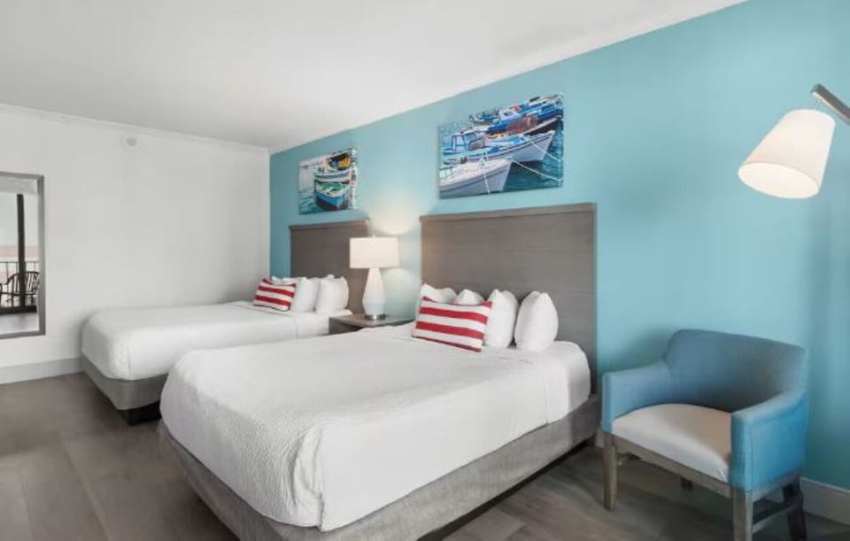 Settle in together with two plush beds and soothing colors.