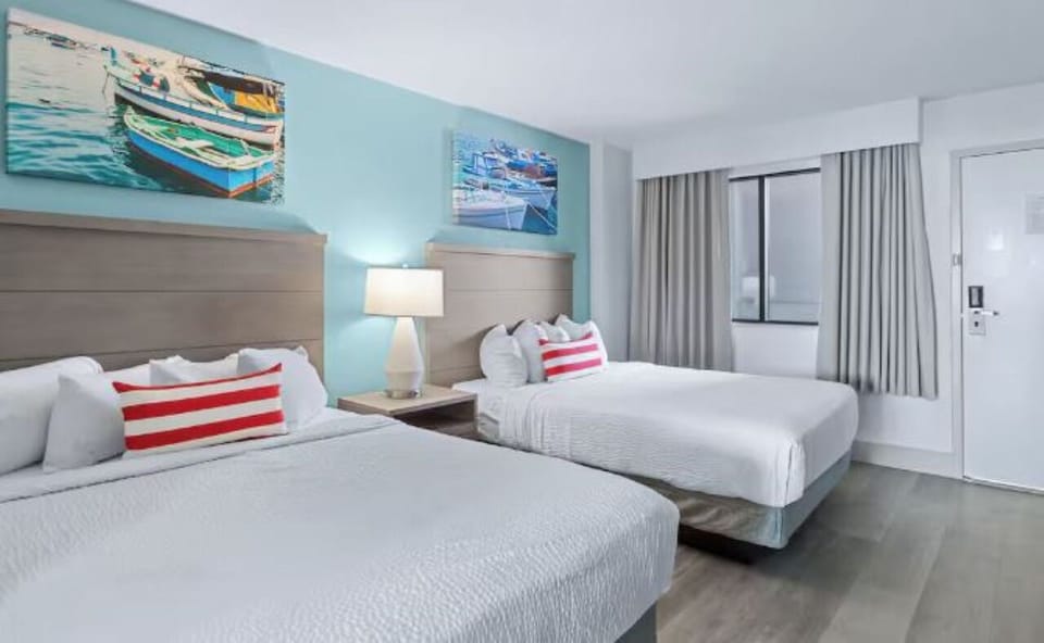 Stretch out on two comfy beds after a beach day.