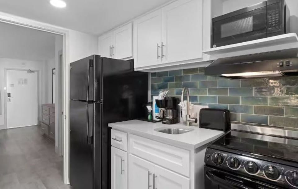 Cook easy meals in a bright kitchen with modern appliances.