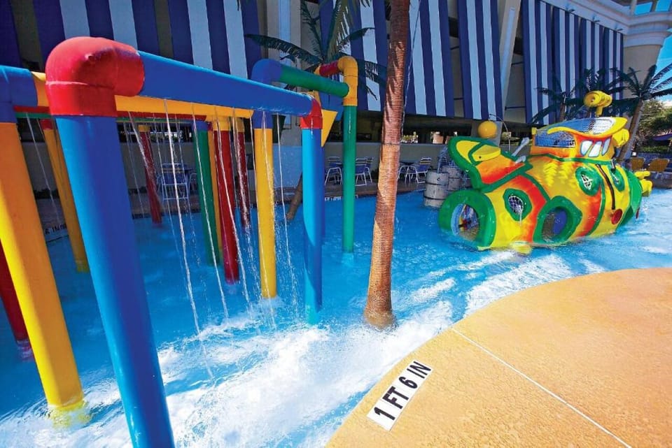 Let kids giggle through colorful splash zones and cool water.