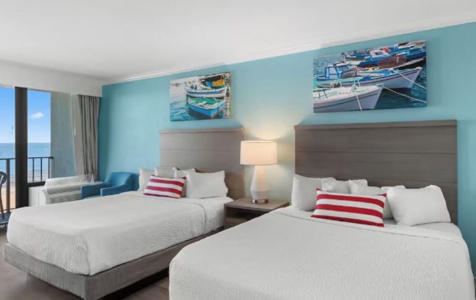 Unwind in crisp beds with calming seaside-inspired comforts.