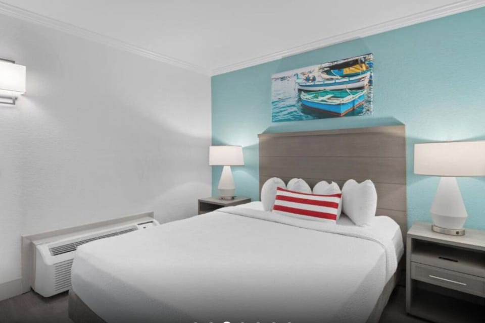 Drift off in a serene, coastal-inspired king bedroom.
