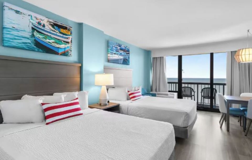 Wake up to ocean breezes from two plush beds.