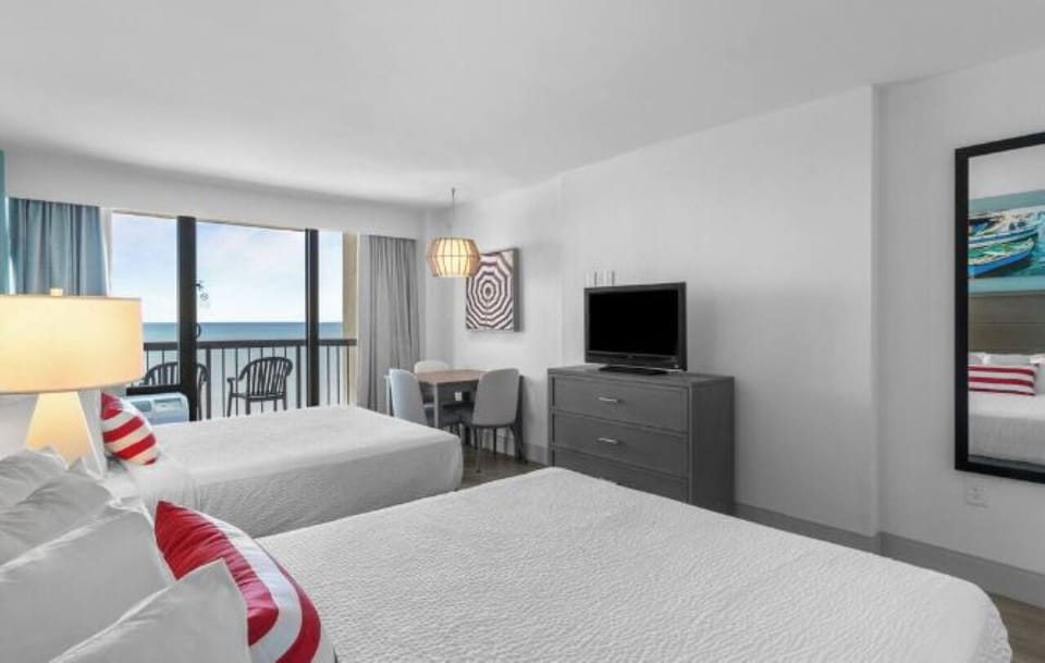 Settle in for movie nights with the ocean beyond.
