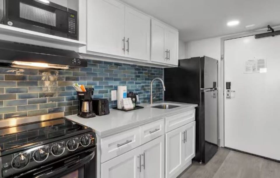 Cook beach-day bites in a sleek, well-equipped kitchenette.