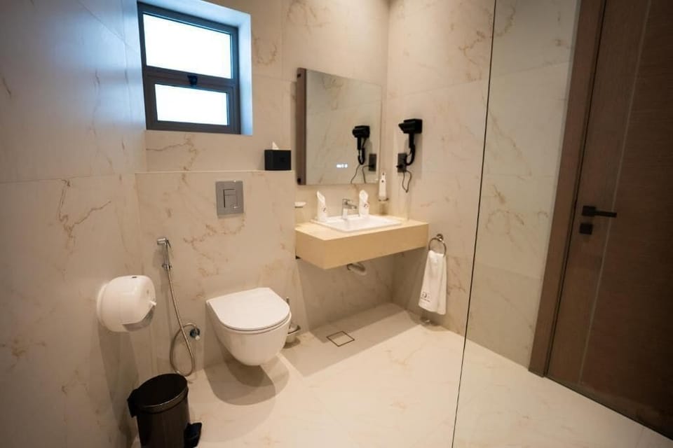 Double or Twin Room, City View | Bathroom | Shower, free toiletries, hair dryer, slippers