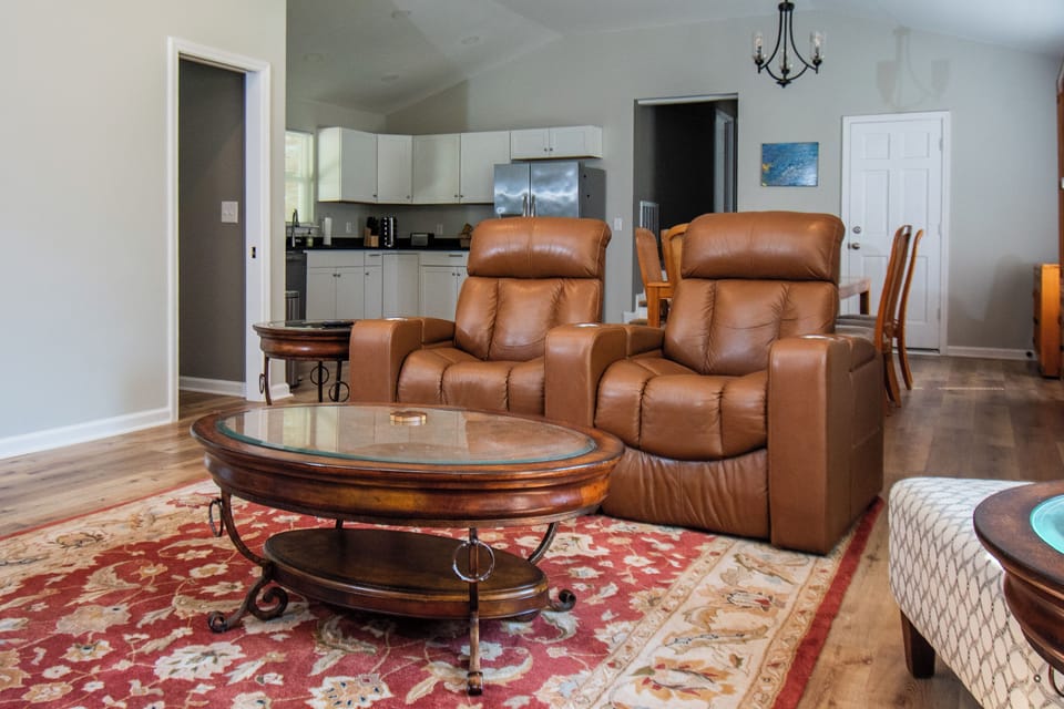 The living room features some of our favorite chairs to relax in!
