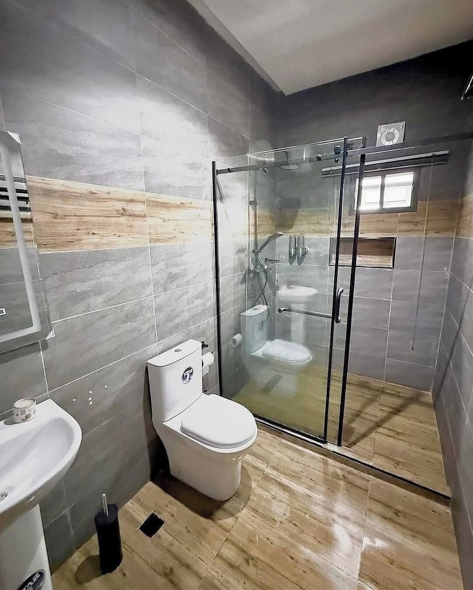 Family Room, Balcony, City View | Bathroom | Free toiletries, hair dryer, towels, soap