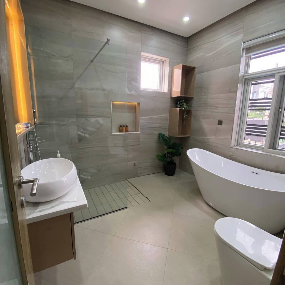 Family Room, Balcony, City View | Bathroom | Free toiletries, hair dryer, towels, soap