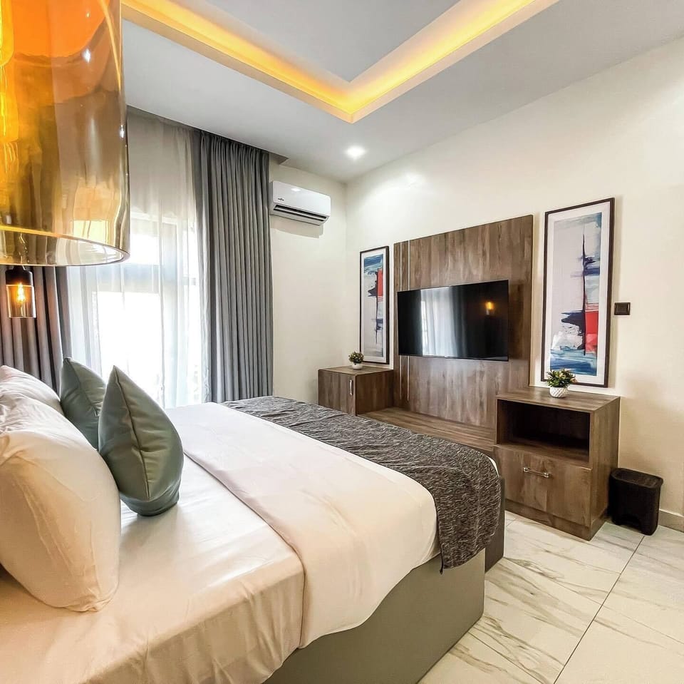 Family Room, Balcony, City View | Desk, laptop workspace, blackout drapes, soundproofing