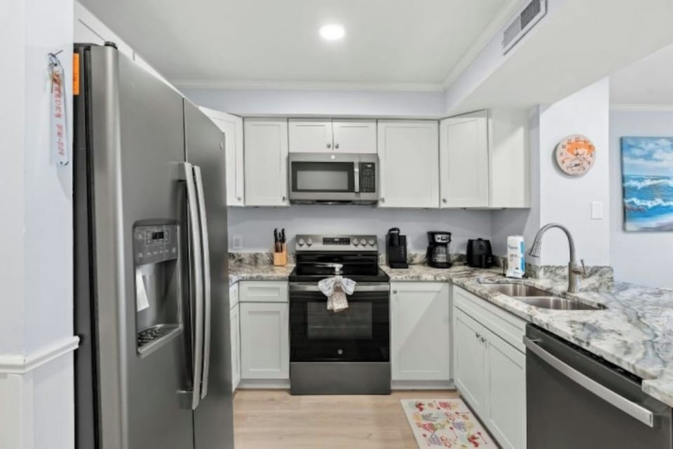 An updated kitchen makes preparing meals a breeze.