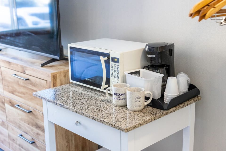 Convenient coffee maker, microwave, and essentials for an easy stay