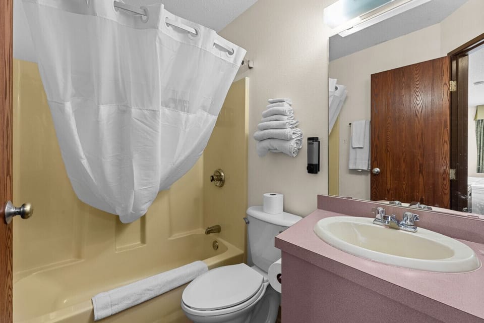 Clean, refreshed bathroom with fresh towels and essentials for a comfortable stay