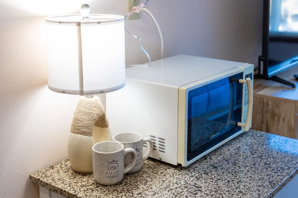 Convenient coffee maker, microwave, and essentials for an easy stay