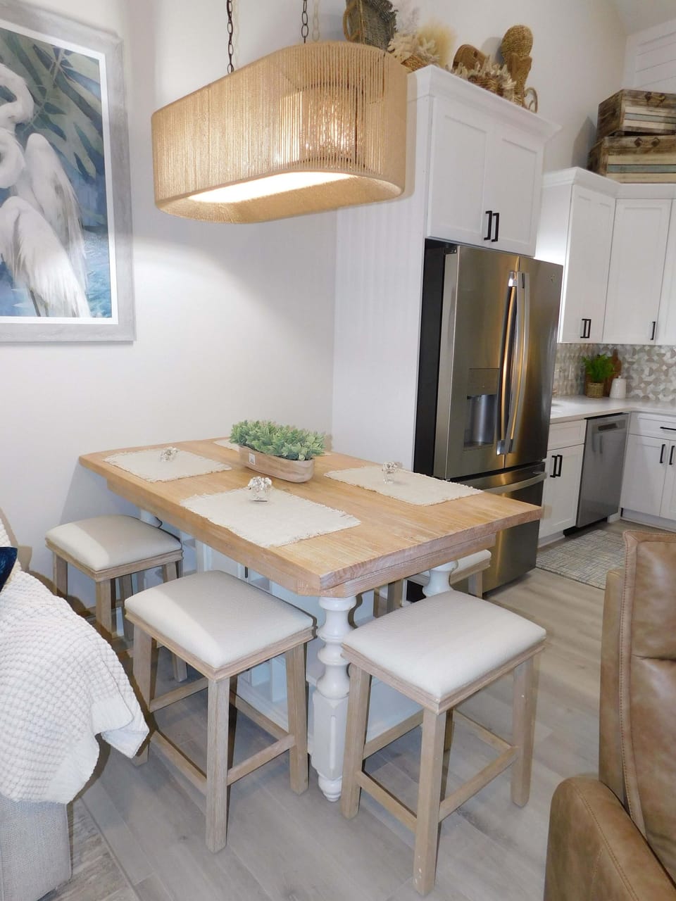 Cozy dining nook with modern lighting and seating