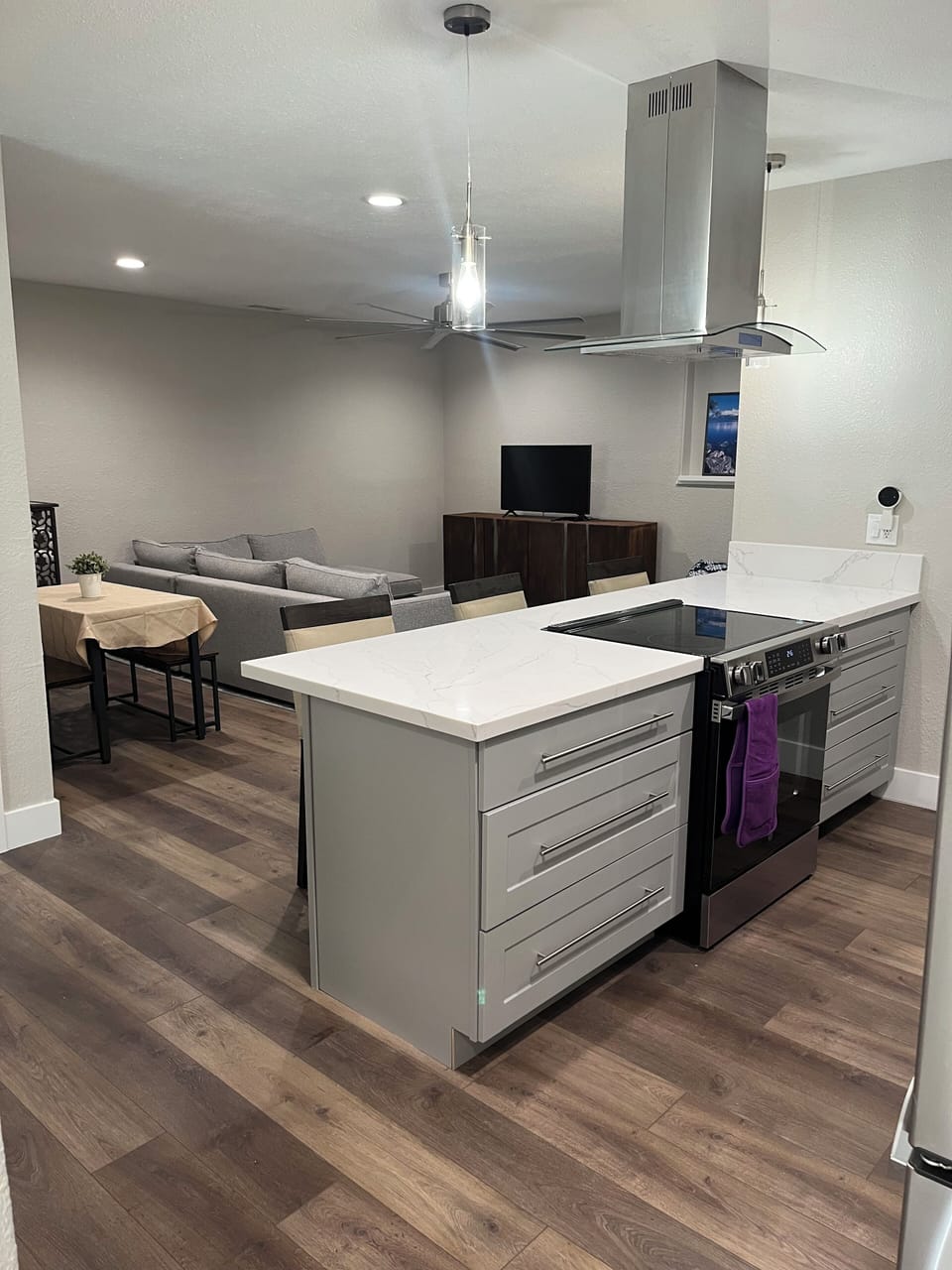 Kitchen Area Opens up into a Bright Open Lounging Area.